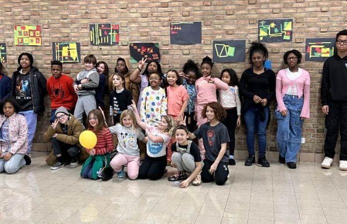  saturday school students pose for a picture